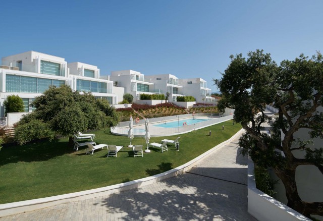 Last luxury townhouses for sale - contemporary design in private residential complex in Sotogrande.